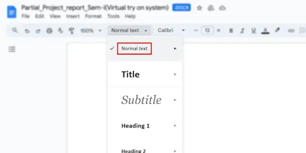 Accédez à la barre de menus et sélectionnez le texte normal